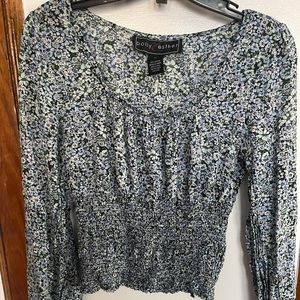 Medium sized blue floral peplum blouse top.